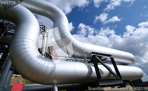 Image of Industrial zone, Steel pipelines on blue sky