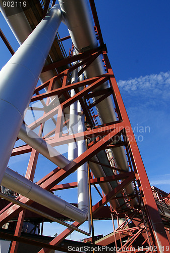 Image of Industrial zone, Steel pipelines and support structures on blue 