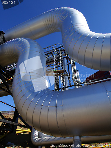 Image of Industrial zone, Steel pipelines on blue sky