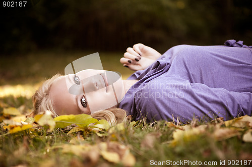 Image of Beautiful autumn woman
