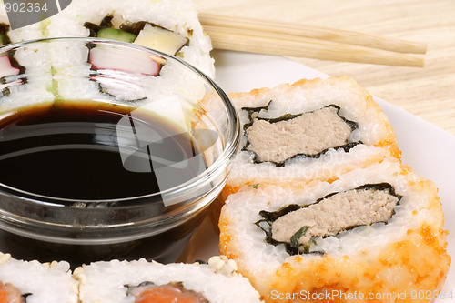 Image of Maki sushi with soy sauce