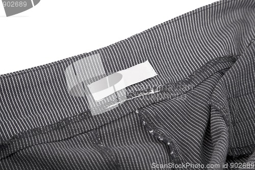 Image of striped fabric and blank tag