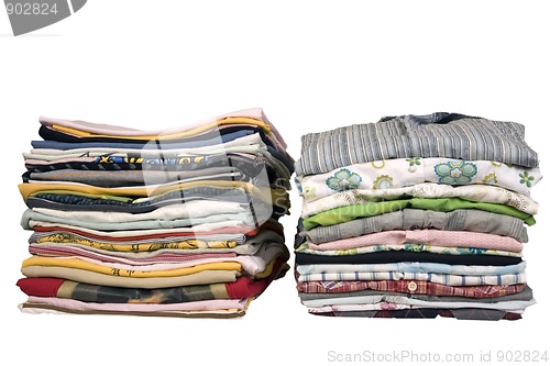 Image of stack of colored t-shirts and shirt