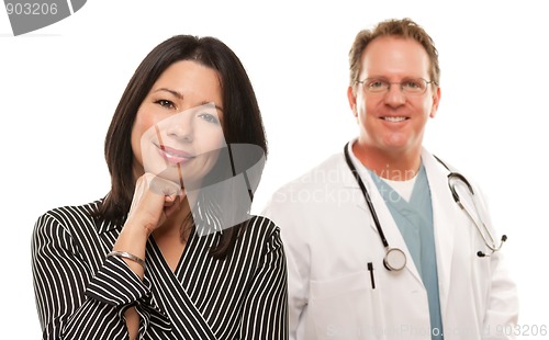 Image of Hispanic Woman with Male Doctor or Nurse