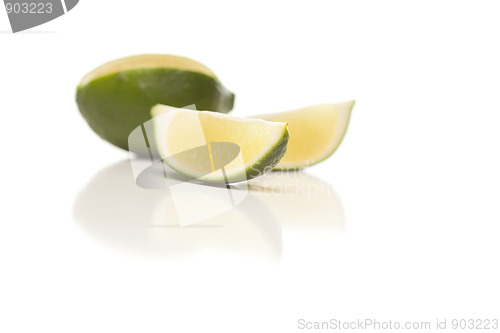Image of Sliced Lime on Reflective White Surface