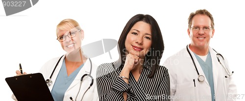 Image of Hispanic Woman with Male Doctor and Nurse