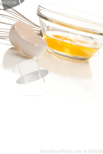Image of Hand Mixer with Eggs in Glass Bowl