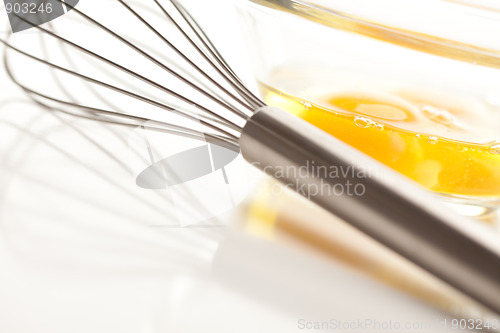 Image of Hand Mixer with Eggs in Glass Bowl