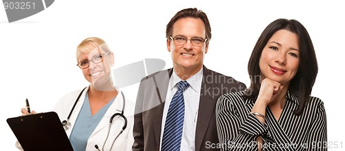 Image of Hispanic Woman with Husband and Female Doctor