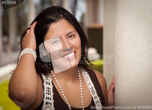 Image of Attractive Hispanic Young Woman Outside