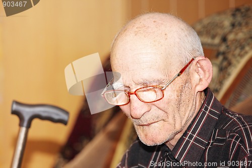 Image of Pensive senior on sofa