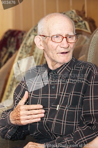 Image of Senior man talking