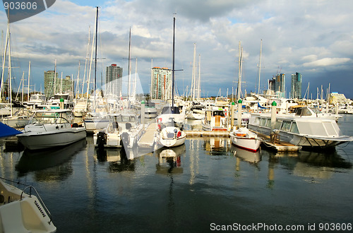 Image of Marina Boats Against Towers