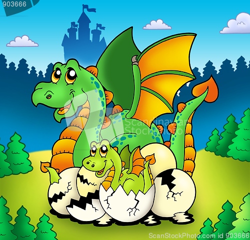 Image of Dragon mom with baby in forest