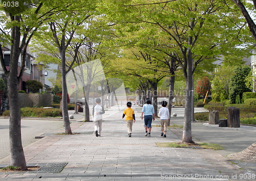 Image of   Children group walking on a street-low size looks good.