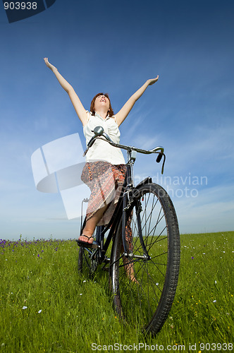 Image of Girl with a bicycle