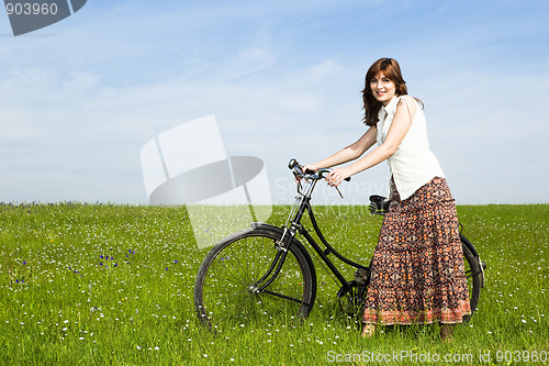 Image of Girl with a bicycle