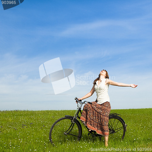 Image of Girl with a bicycle