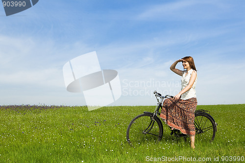 Image of Girl with a bicycle
