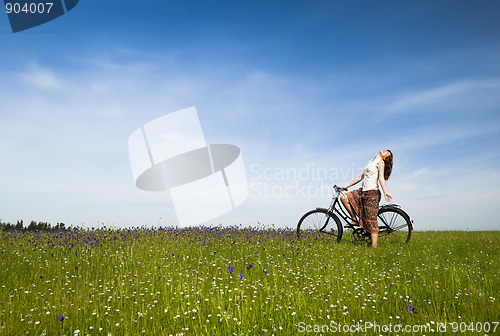 Image of Girl with a bicycle