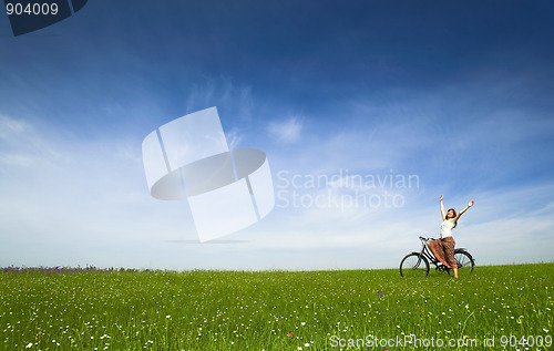 Image of Girl with a bicycle