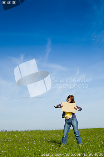 Image of Girl with a paper card