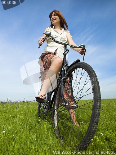 Image of Girl with a bicycle