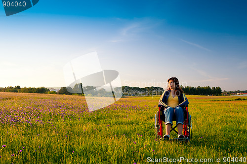 Image of Handicapped woman on wheelchair