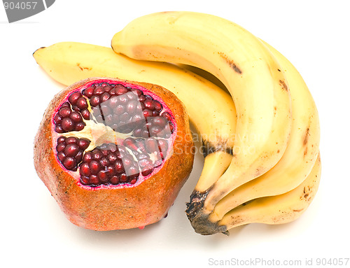 Image of Pomegranate and bunch of bananas