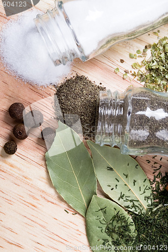 Image of spices on wooden background 