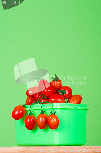 Image of container with fresh tomatoes
