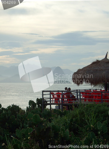 Image of Kiosk in the sunset on the beach