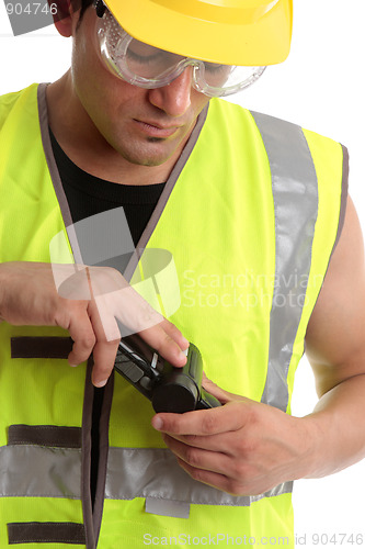 Image of Builder with measuring device