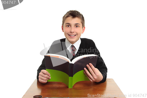 Image of Happy school student with textbook