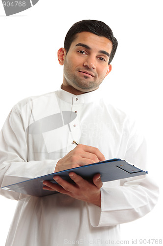 Image of Ethnic businessman writing