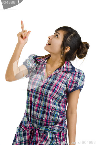 Image of beautiful woman pointing up at something