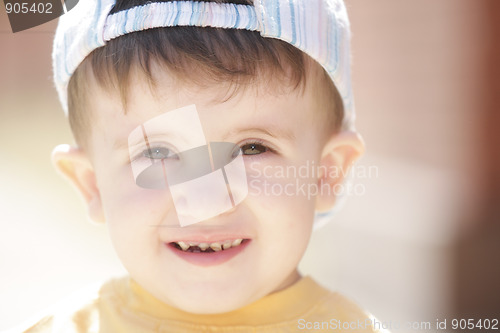 Image of Little boy in yellow shirt