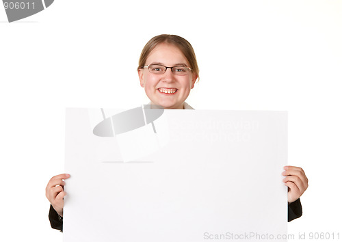 Image of young woman holding sign