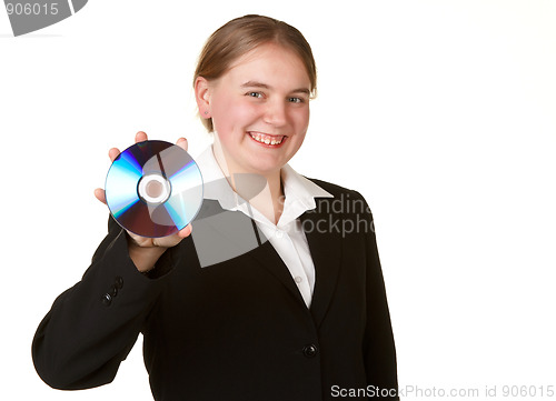 Image of young woman holding cd or dvd