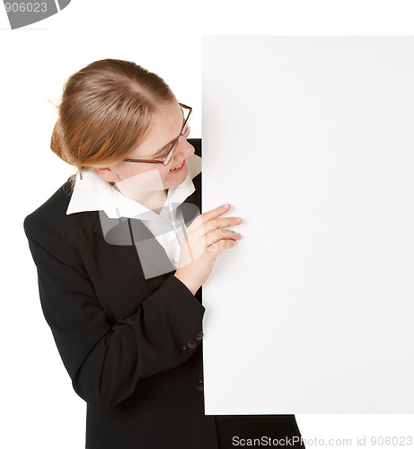 Image of young business woman with placard