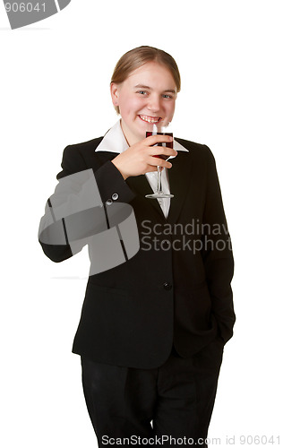 Image of young business woman with glass wine