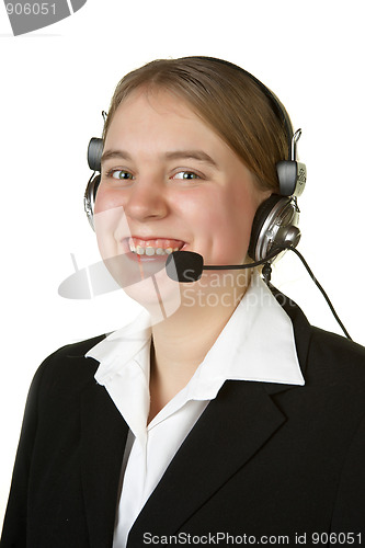 Image of young business woman with headset  isolated on white