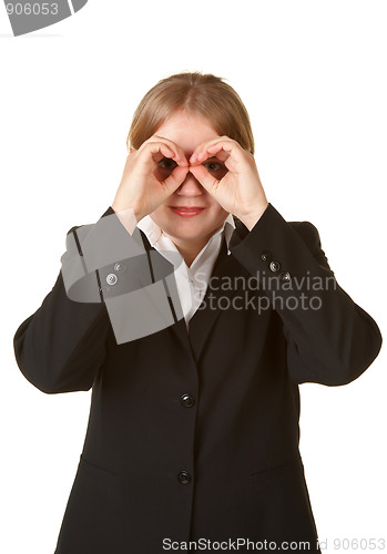 Image of young business woman hands like binoculars