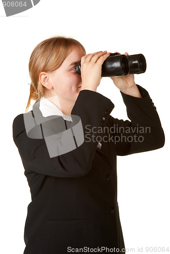 Image of young business woman with binoculars