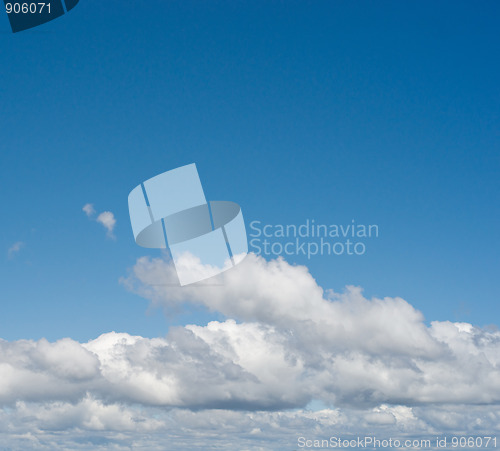 Image of white fluffy clouds in the sky