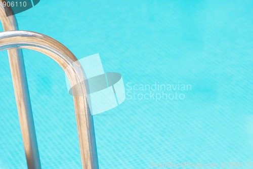 Image of Pool abstract, ladder railings and copy space on the water