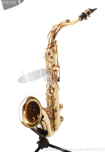 Image of An brass saxophone on the stand.