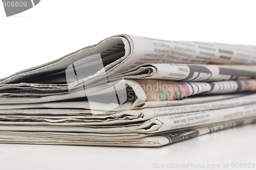 Image of newspaper stack, information concept