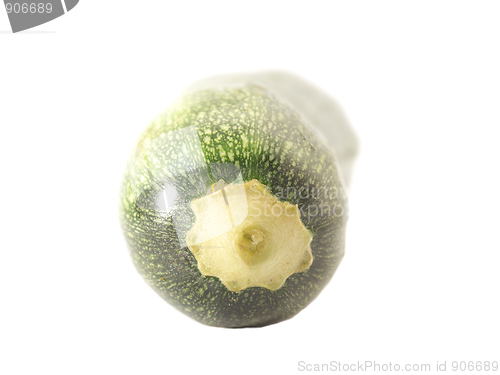 Image of Single green zucchini isolated on white