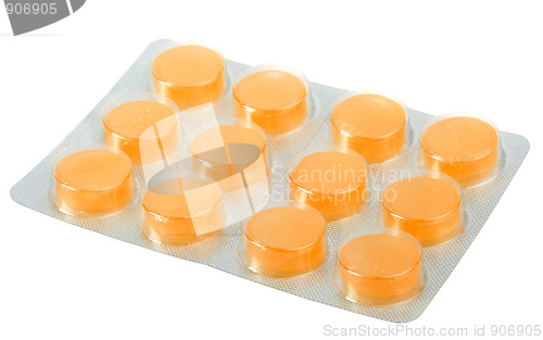 Image of Orange pills in metallic blister